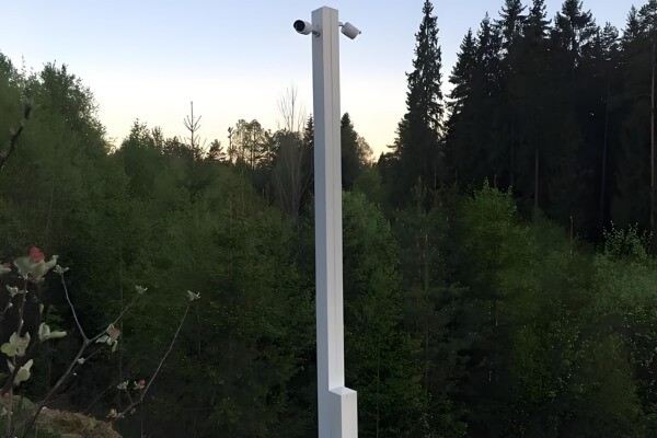 hidden security camera placement outdoors and indoors in a residential setting
