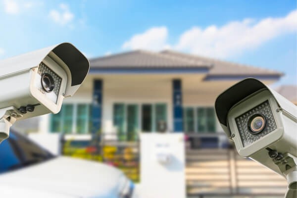 Illustration of ideal camera placement for optimal security coverage, focusing on entryways and high-traffic areas.